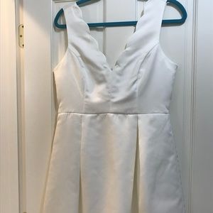 White satin scalloped dress. NWT